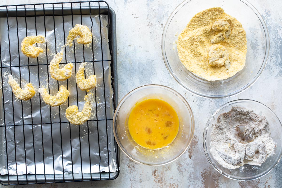 Shrimp being breaded for Shrimp Po' Boy.
