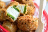 A basket of bite-sized jalapeño poppers.