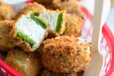 A basket of bite-sized jalapeño poppers.