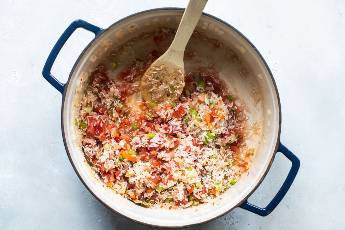 Wisconsin Style Jambalaya being cooked in a Dutch oven.