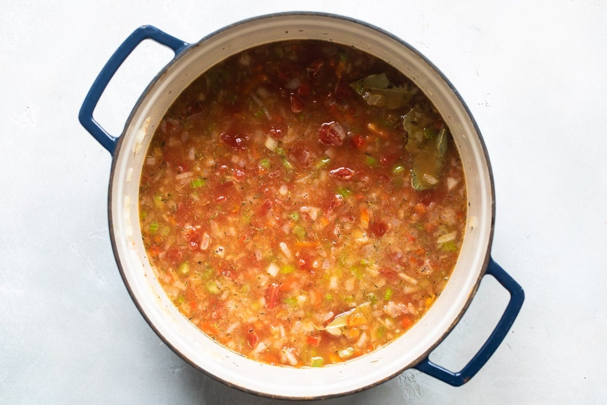Wisconsin Style Jambalaya being cooked in a Dutch oven.