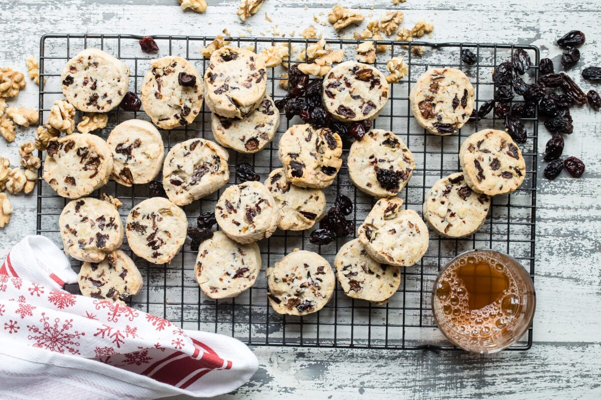 Fruitcake cookies on a cooling rack.