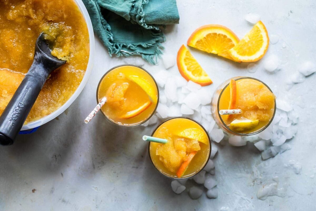 Three glasses filled with brandy slush.