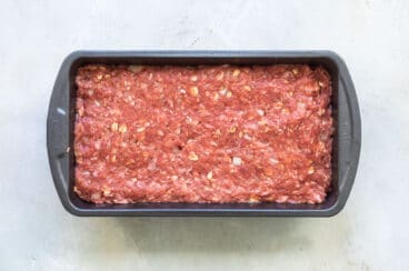 Meatloaf mixture in a baking pan.