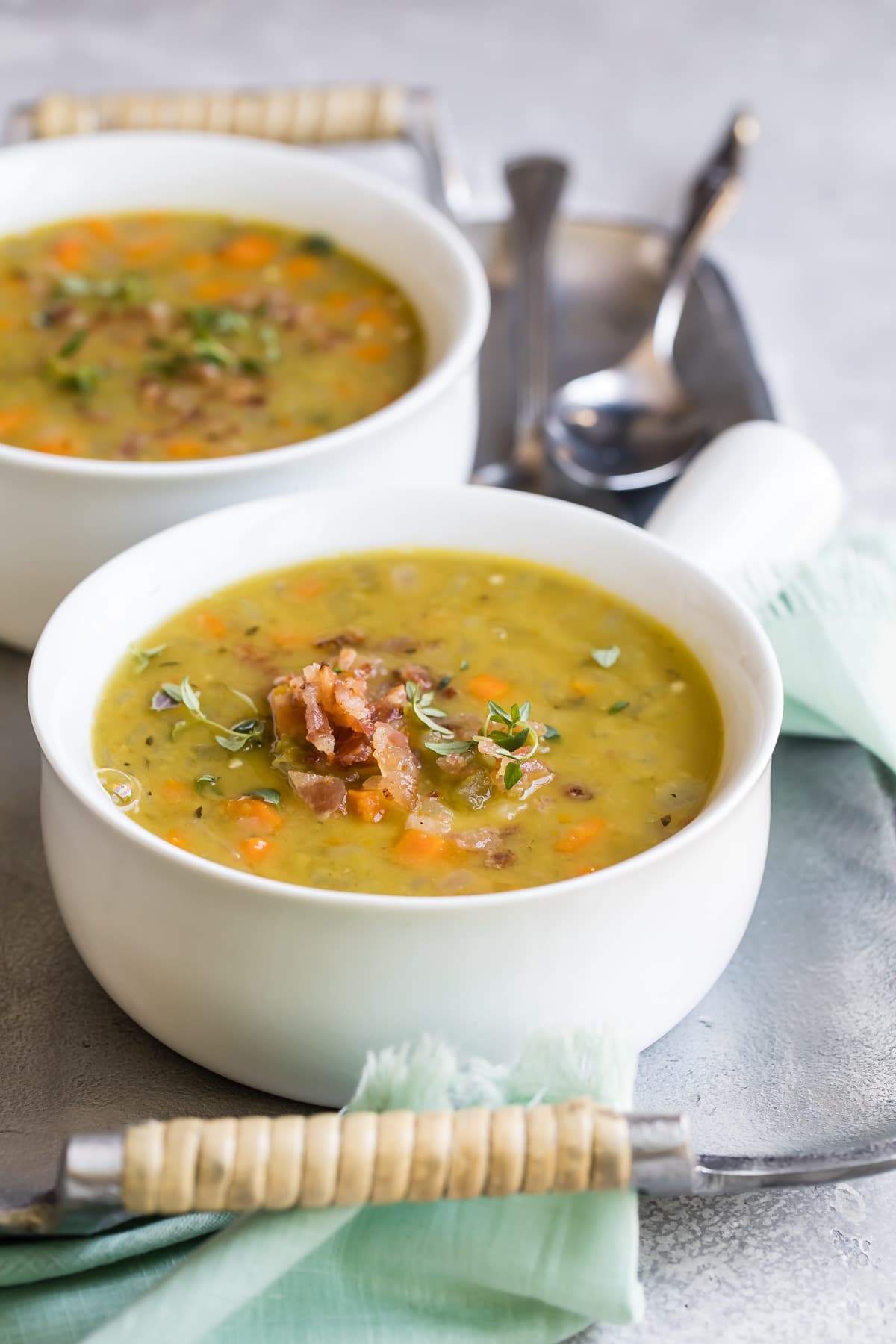 Split pea soup in a white bowl.