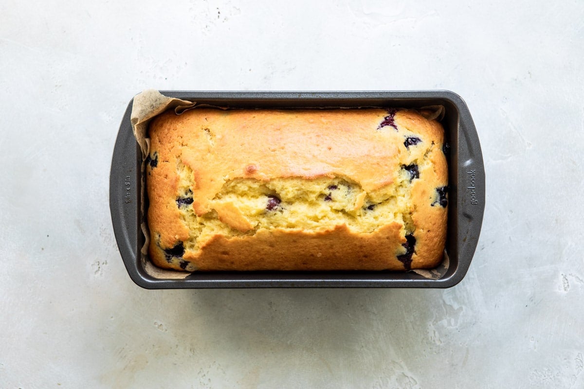 A loaf of blueberry lemon yogurt cake after being baked.