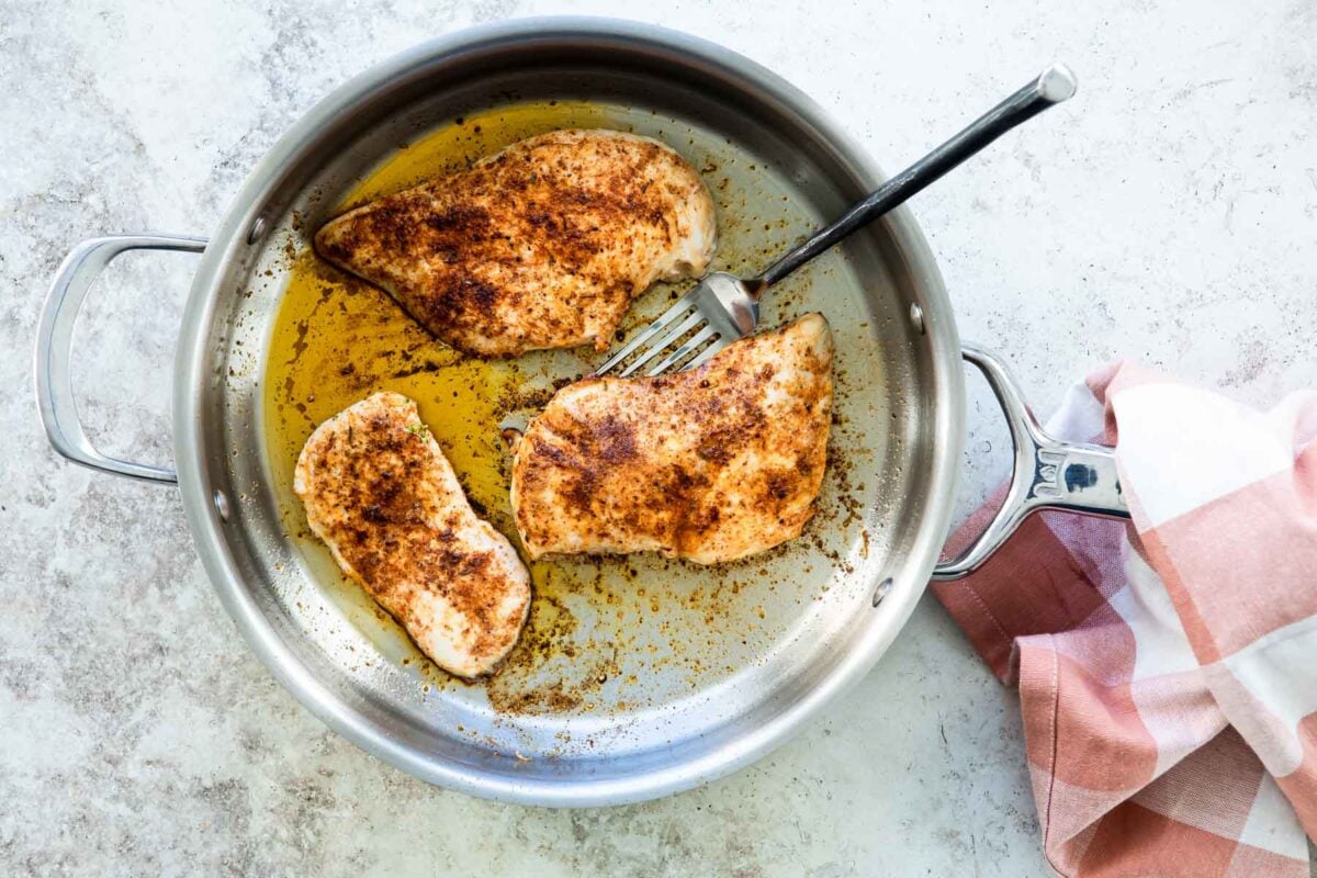 Cajun chicken in a skillet.