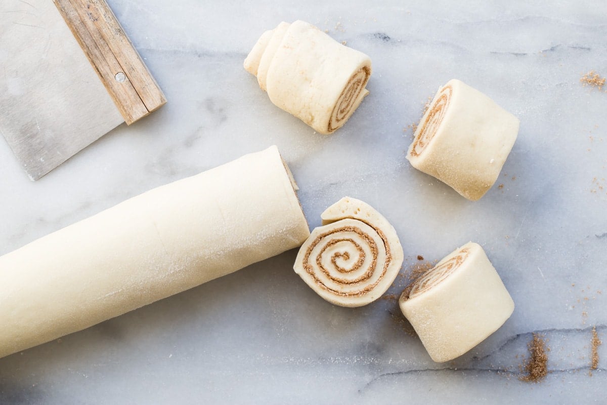 Cinnamon rolls rolled up and cut into pieces.