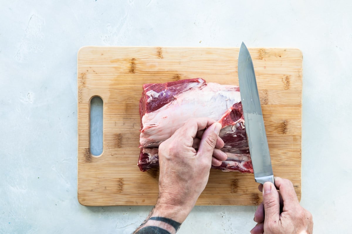 Fat being trimmed off of a beef tenderloin.