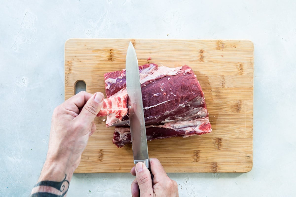 Fat being trimmed off of a beef tenderloin.