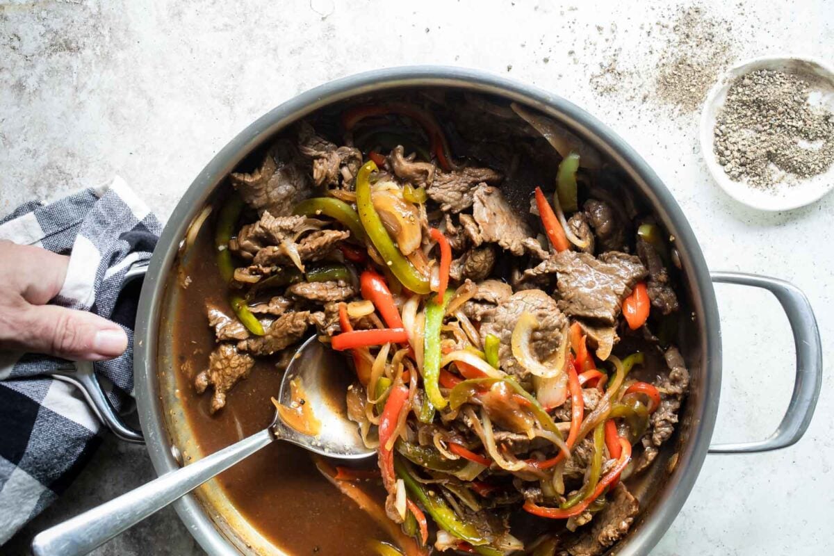 A skillet full of Midwest Pepper Steak.