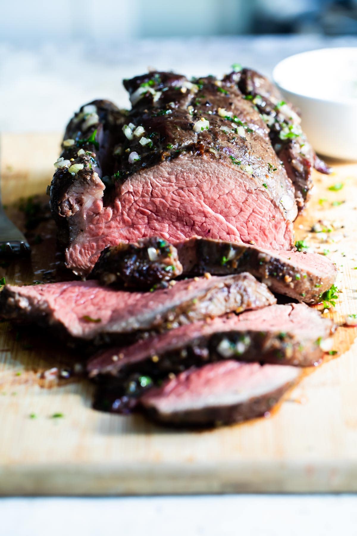 A sliced roast beef tenderloin.