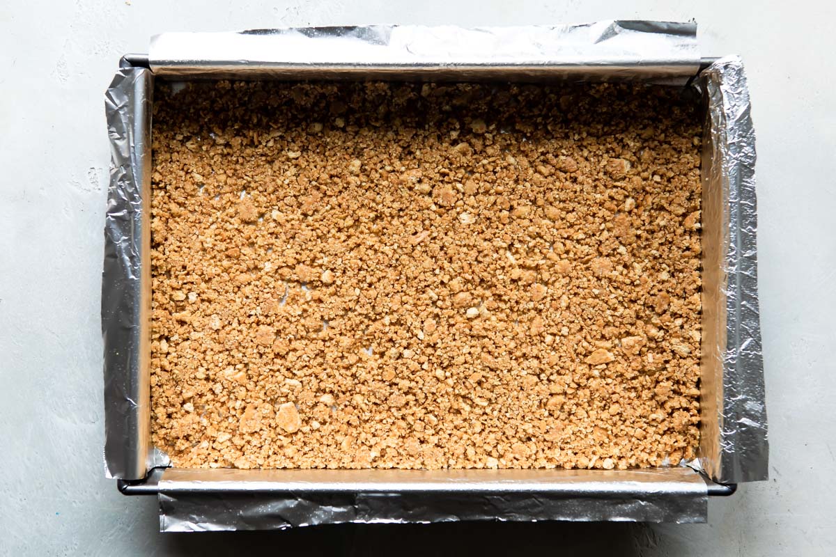 Graham cracker pieces in a baking pan.