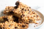 Seven layer bars on a gray plate.