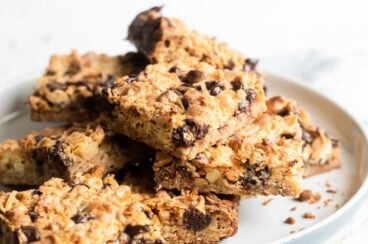 Seven layer bars on a gray plate.