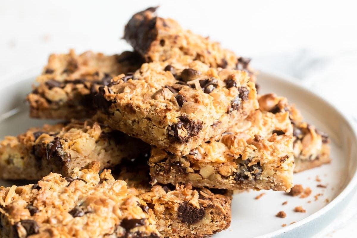 Seven layer bars on a gray plate.