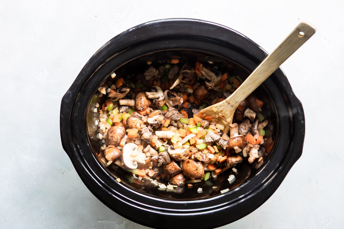 Slow cooker beef barley soup before being cooked in a crockpot.