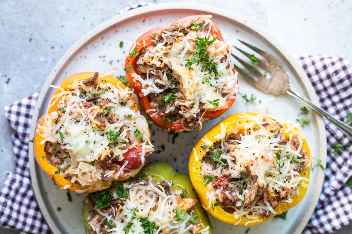 A platter of stuffed bell peppers.