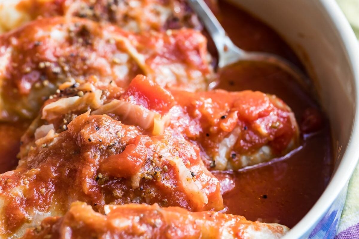 Stuffed cabbage rolls in a casserole dish.