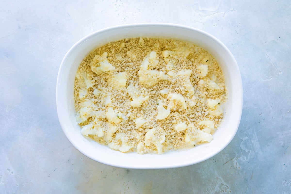 Cauliflower gratin in a casserole dish before being baked.