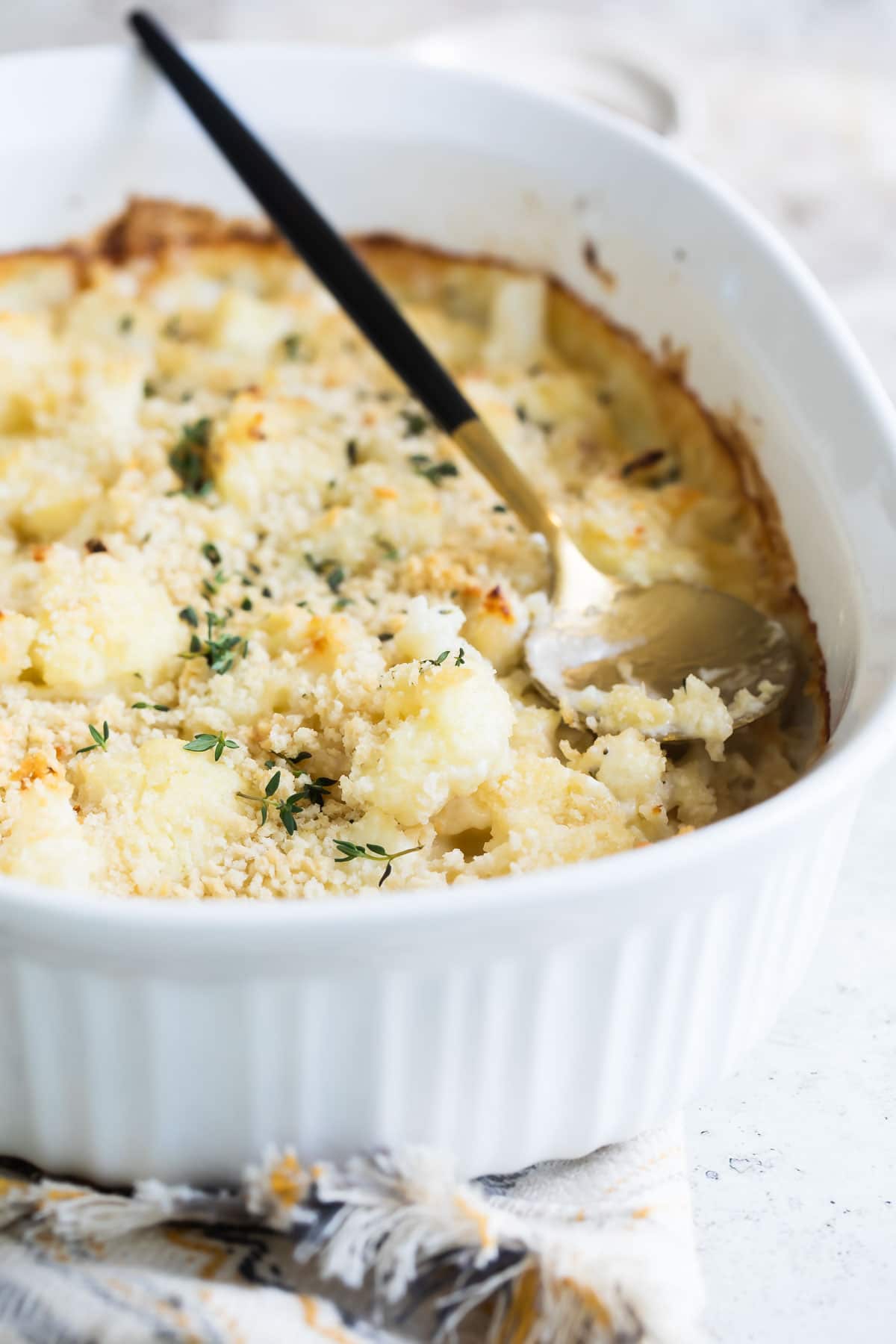 Cauliflower gratin in a casserole dish.