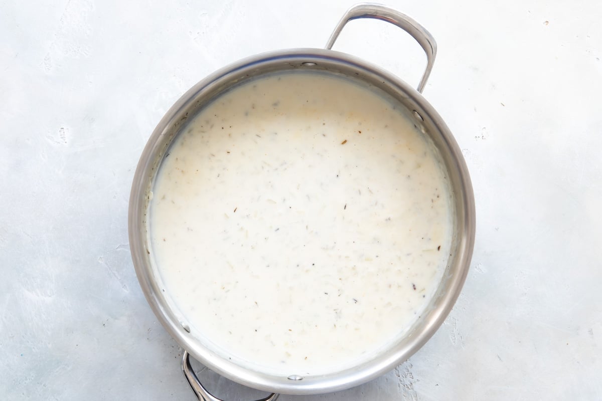 Gravy in a saucepan.