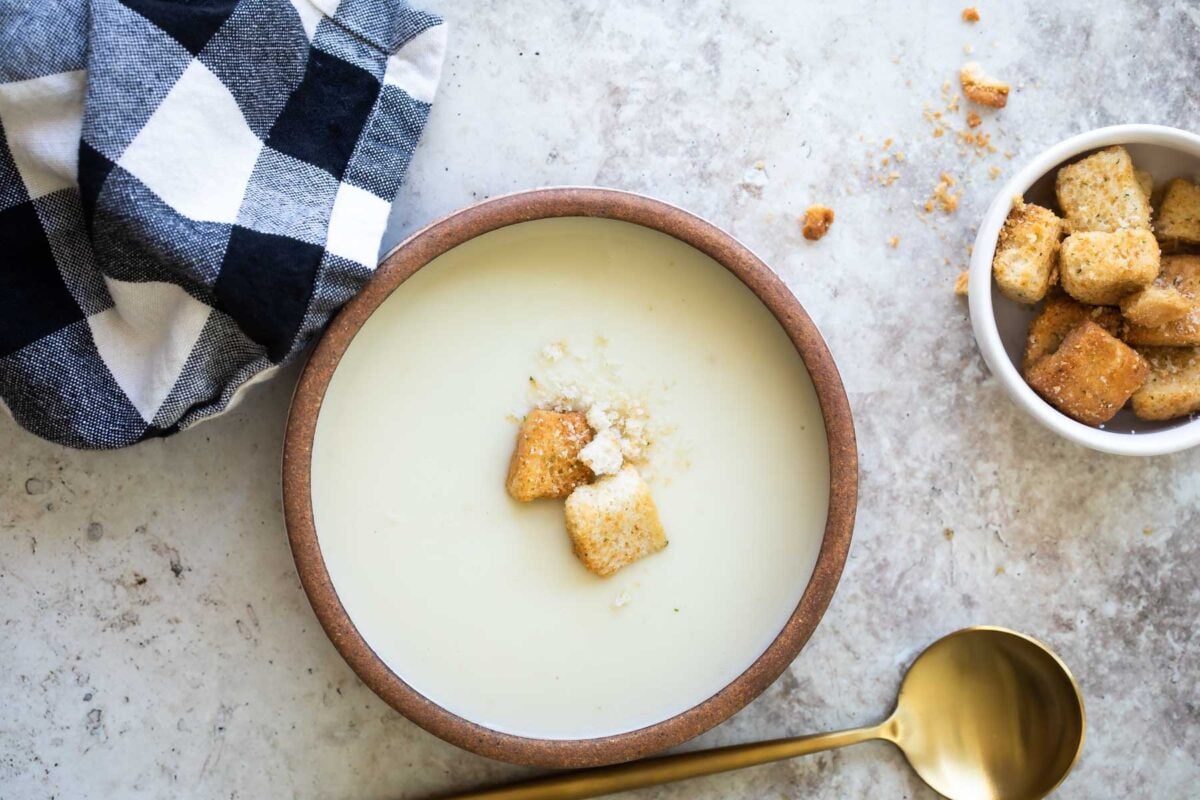 A bowl of Cream of Cauliflower Soup.
