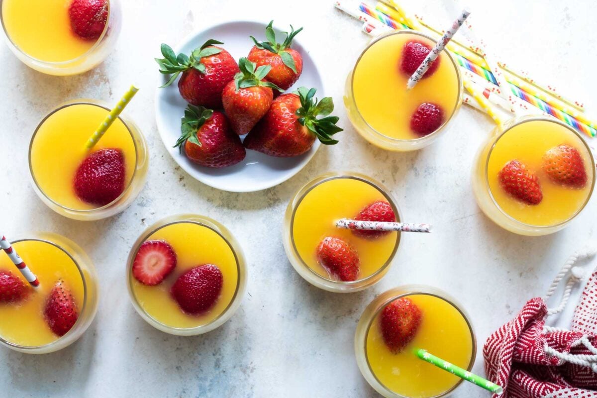 Fruit punch in eight glasses.