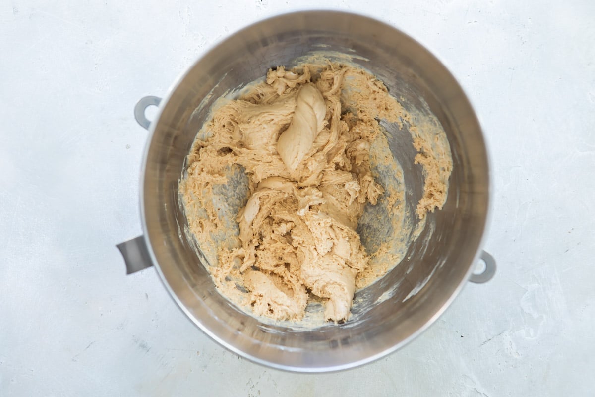 Nougat mixture in a silver mixing bowl.
