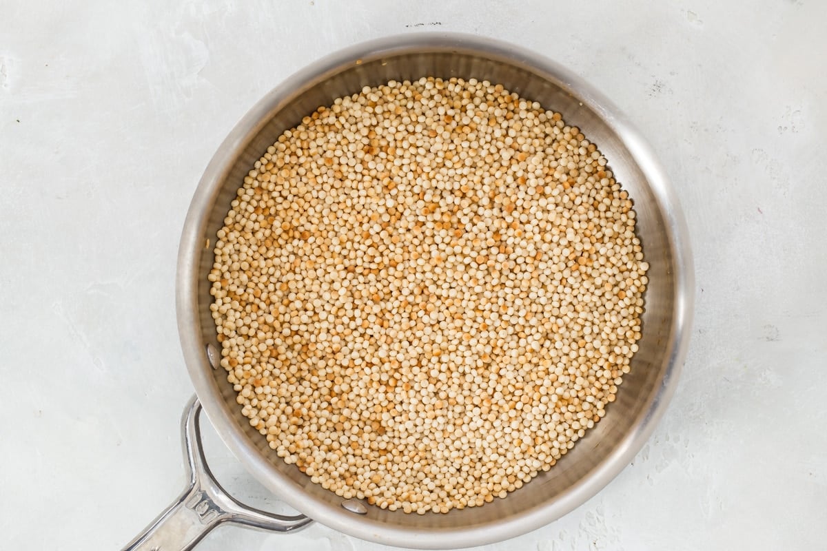 Couscous in a silver saucepan.