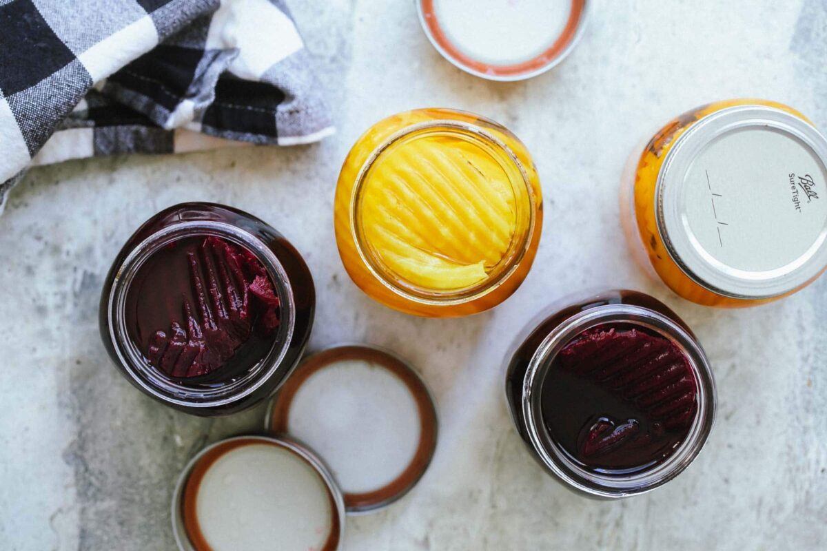 Four jars of pickled beets.