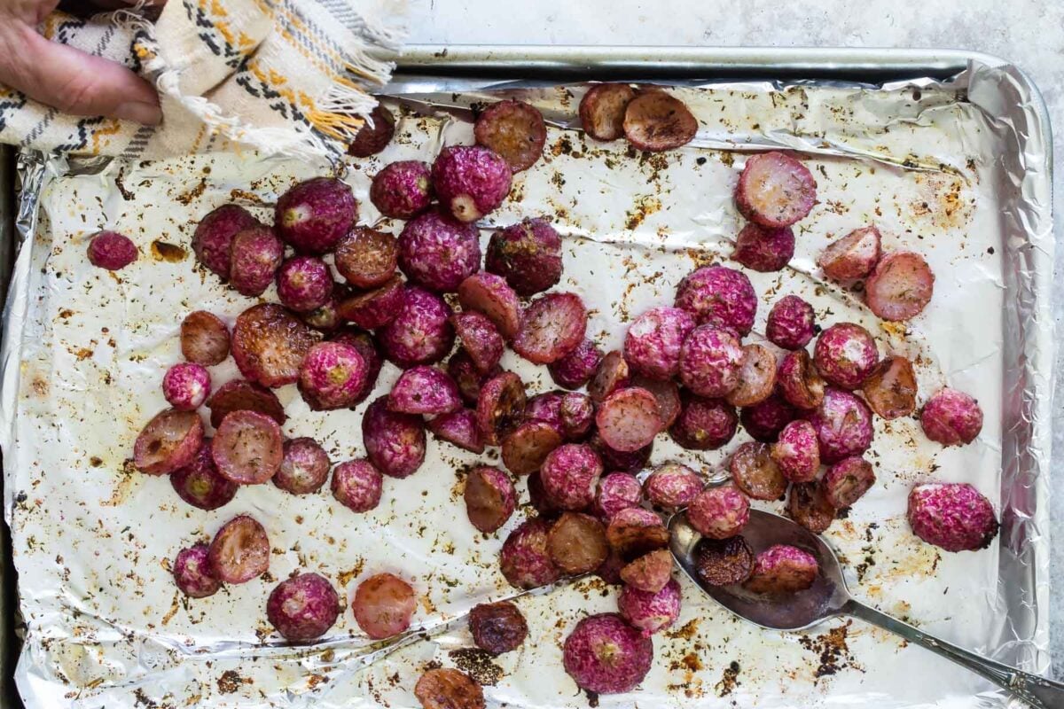 Roasted radishes on a baking sheet.