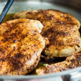 Cajun chicken in a skillet.