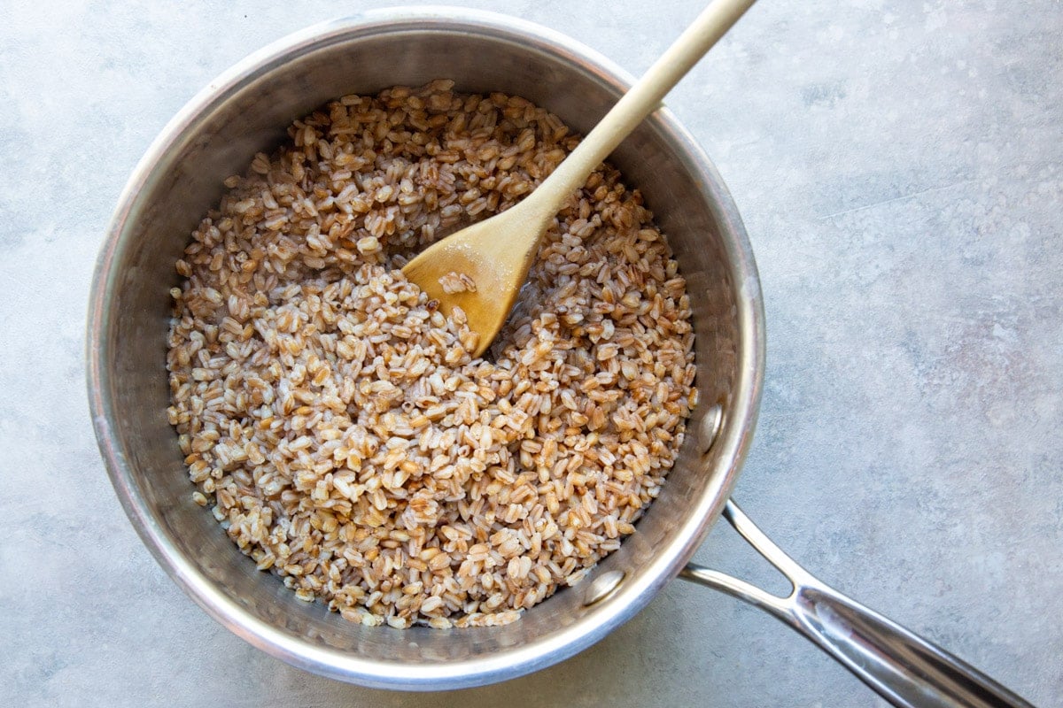 Cooking farro in a saucepan.