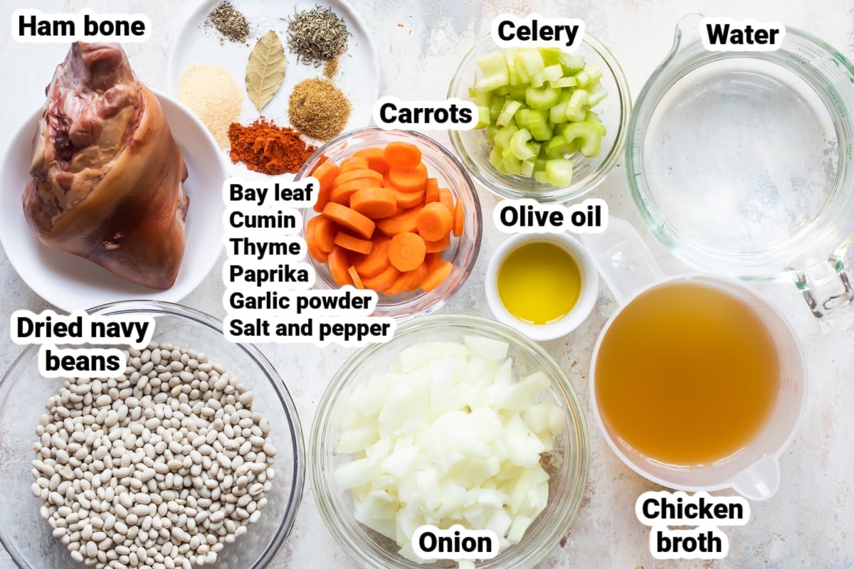 Labeled ingredients for slow cooker ham and bean soup.