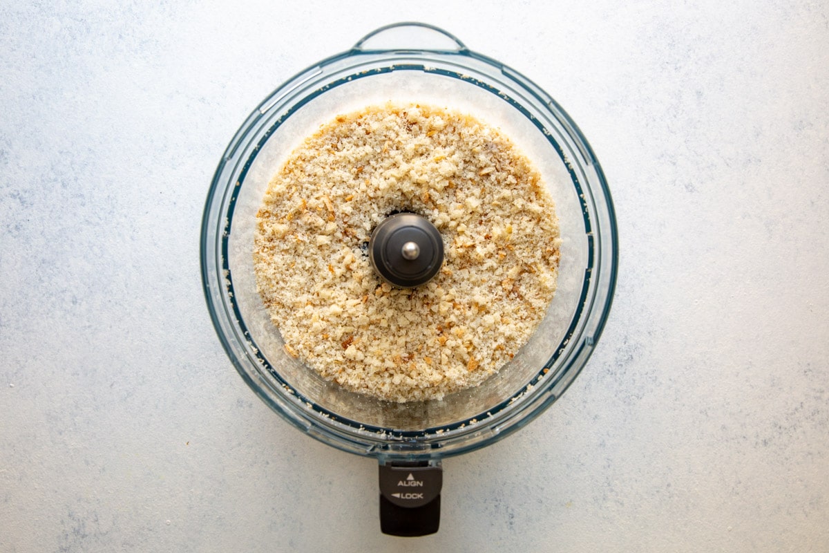 A food processor full of bread crumbs.