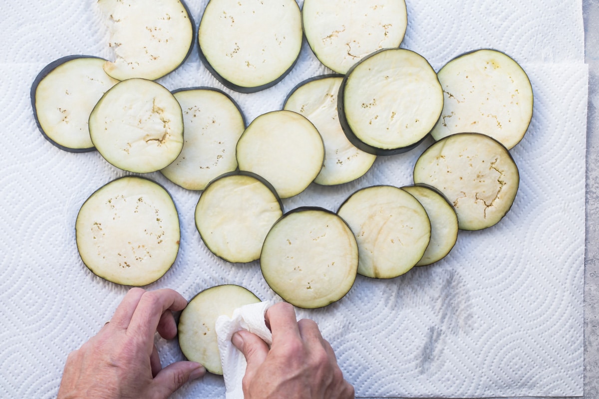 Eggplant slices being dried.