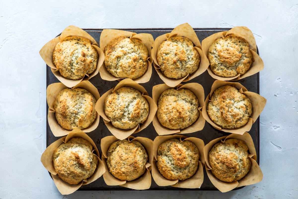 Lemon Poppy Seed Muffins baked in paper cups.