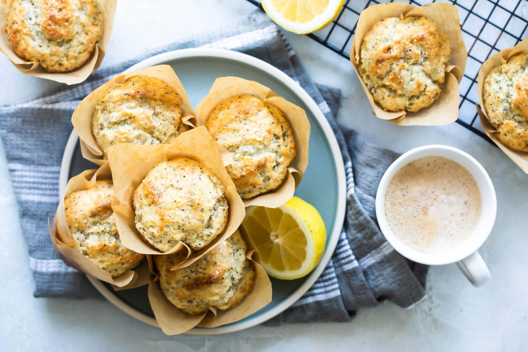 Lemon Poppy Seed Muffins baked in paper cups.