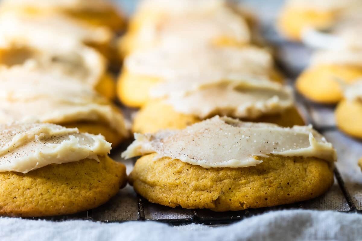 Pumpkin cookies on a cooling rack.