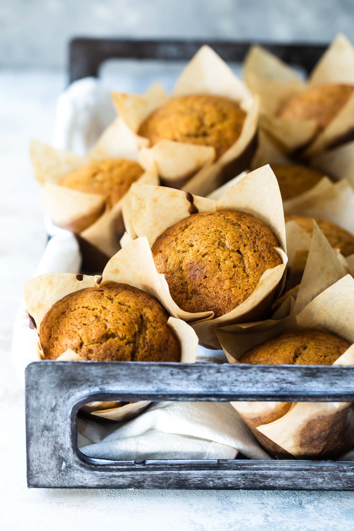 Pumpkin muffins on a serving tray.