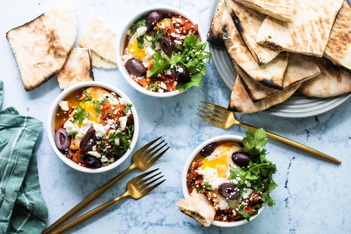Three bowls of shakshouka.