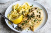 A plate of chicken scallopini.