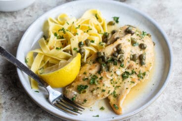 A plate of chicken scallopini.