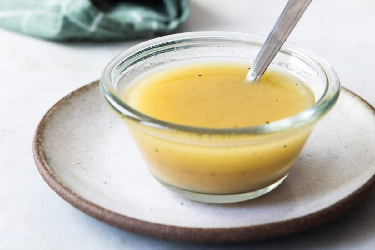 A bowl of apple cider vinaigrette.