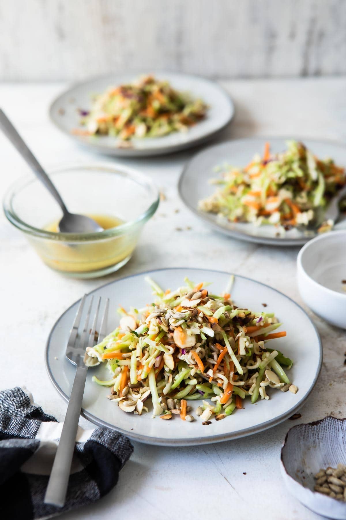 Plates of Crunchy Broccoli Slaw.