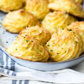 A platter of fluffy Duchess potatoes.