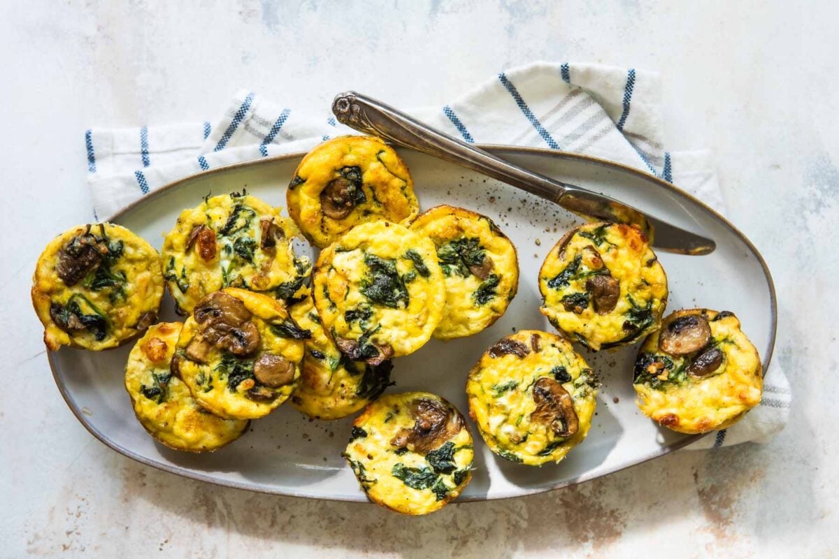 Egg muffins on a gray platter.