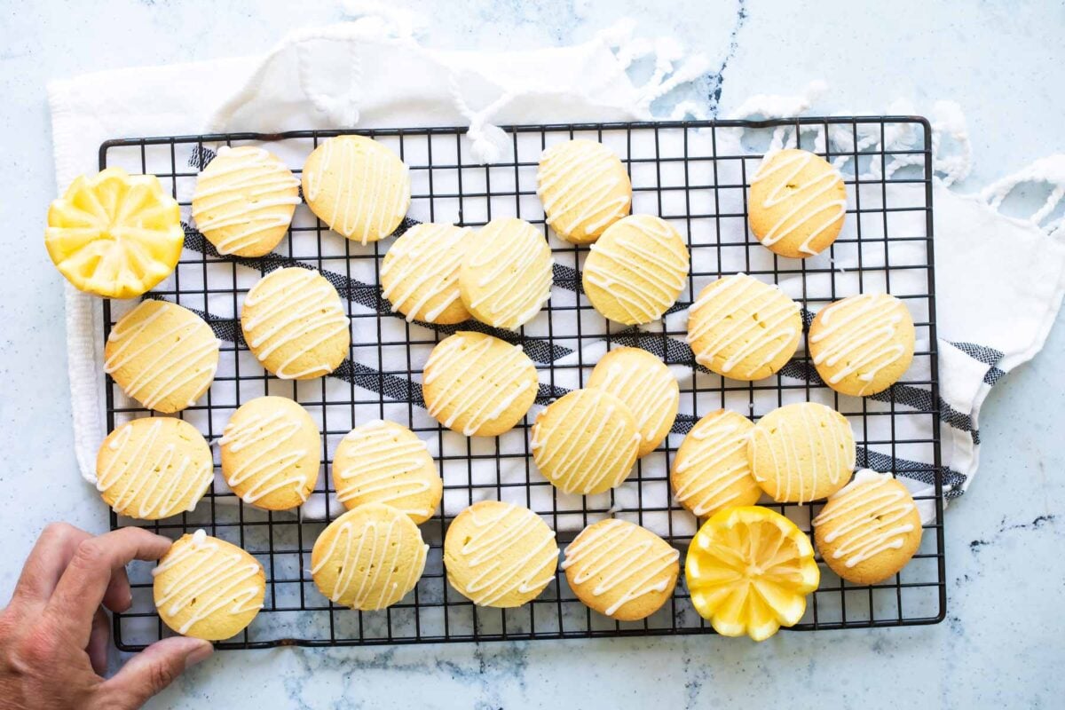 Lemon cookies on a cooling rack.