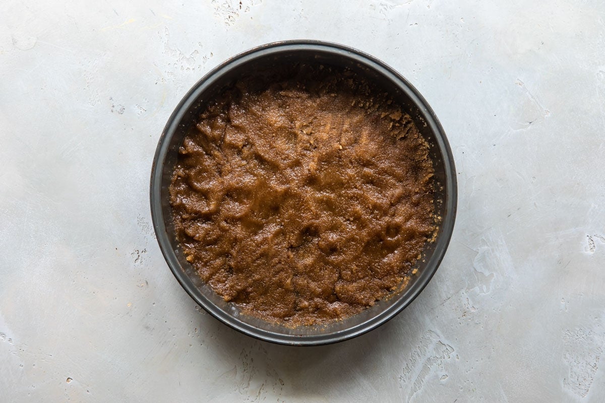 Topping for a pineapple upside down cake in a cake pan.